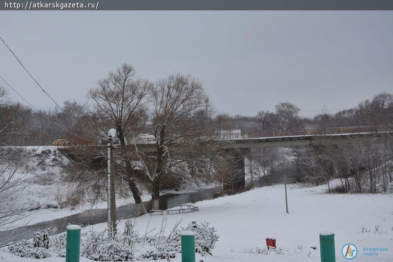 15-минутный снегопад накрыл город белым пушистым покрывалом (ФОТОРЕПОРТАЖ)