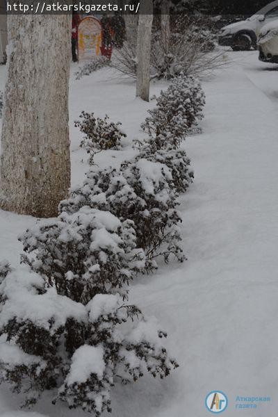 15-минутный снегопад накрыл город белым пушистым покрывалом (ФОТОРЕПОРТАЖ)