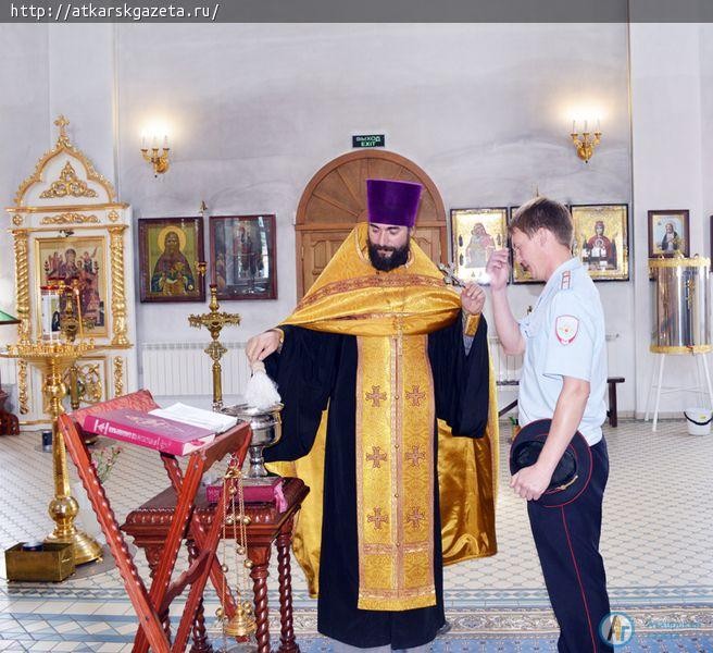 Аткарские стражи порядка приняли участие в молебне в честь 300-летия российской полиции.