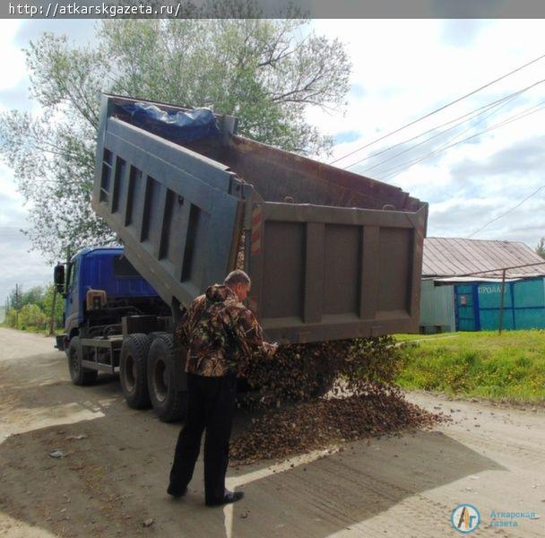 В городе идет ремонт дорог с грунтовым покрытием (фоторепортаж)